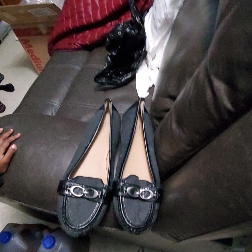 Slightly used black Coach flats